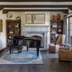 Living Room Features Exposed Beams & Piano