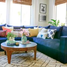Blue Sectional Sofa and Round Coffee Table