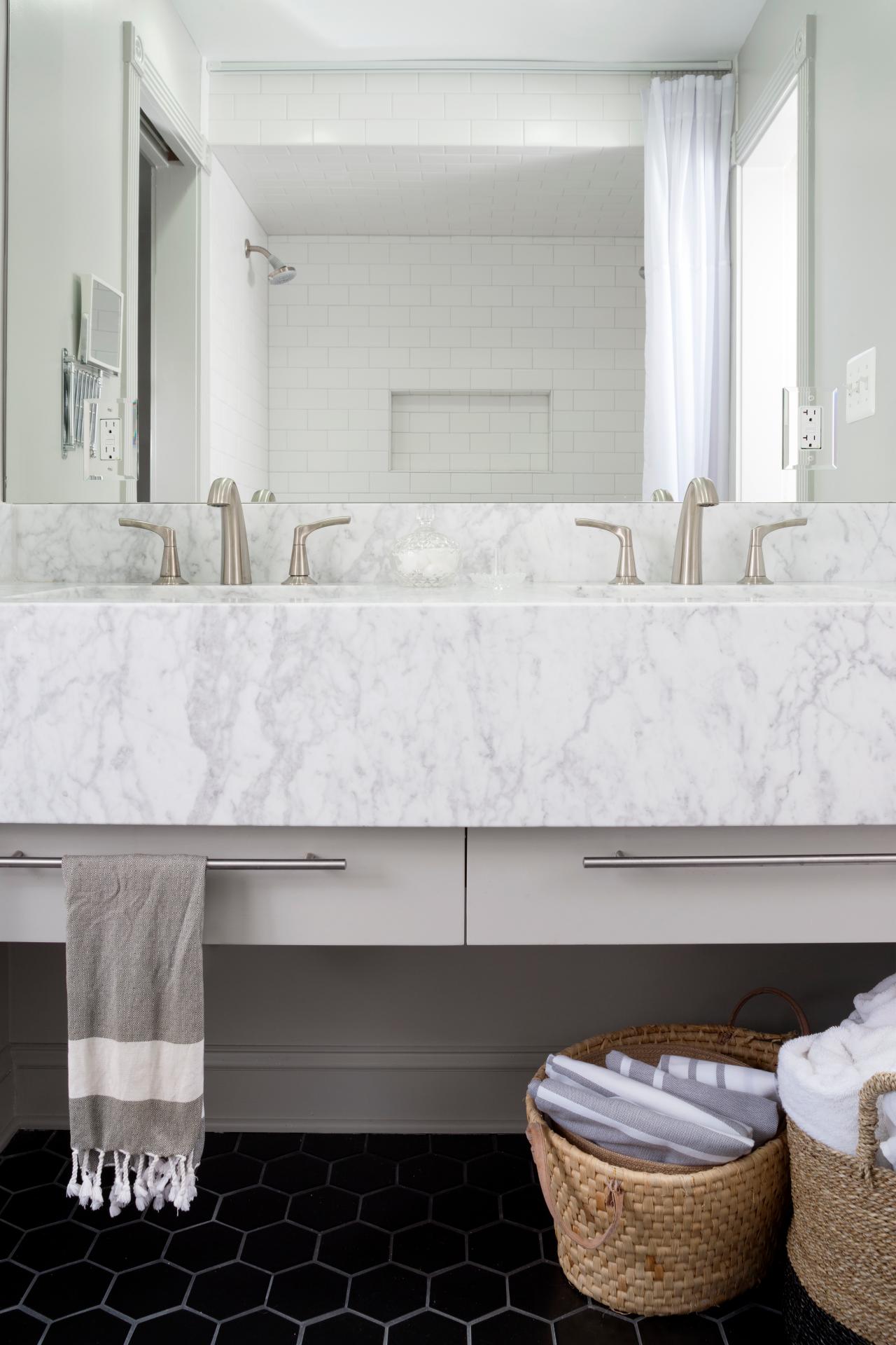 White Marble Floating Vanity and Black Hexagonal Floor