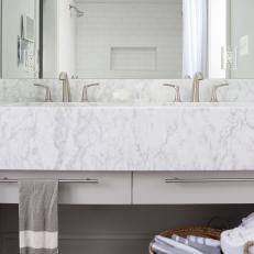 White Marble Floating Vanity and Black Hexagonal Floor Tile in Contemporary Bathroom 