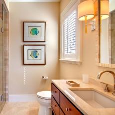 Soothing Neutral Bathroom Features Tropical Artwork
