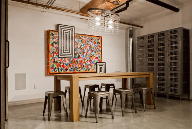 Dining Room With Colorful Painting, Wood Dining Table and Metal Stools