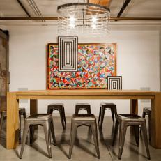 Industrial Dining Room With Wood Table and Metal Stools