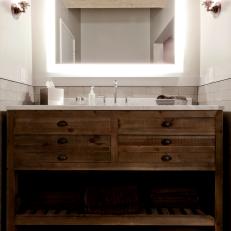 Bathroom Boasts Lighted Mirror and Dresser-Style Vanity