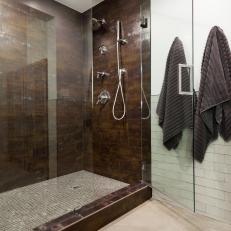 Contemporary Bathroom Features Brown Tile Shower