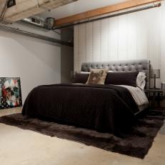 Loft Bedroom With Brown Duvet Cover and Brown Rug