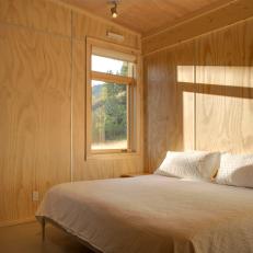 Light Wood Encases Modern Bedroom