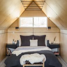 Rustic Neutral Bedroom With Vaulted Roof