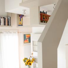 Overhead White Loft View With Shelves and Table