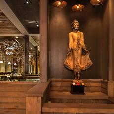 Asian Statue Display Creates Zen Vibe