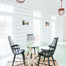 Rounded Shapes Define Chic Dining Area