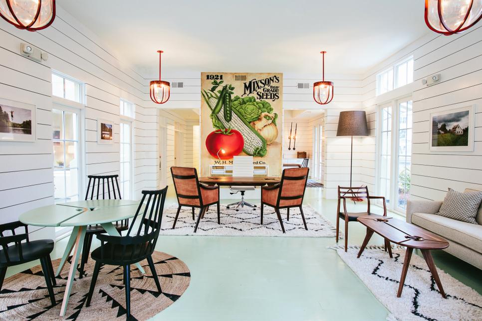 Country Living Space With White Paneled Walls and Vegetable Mural