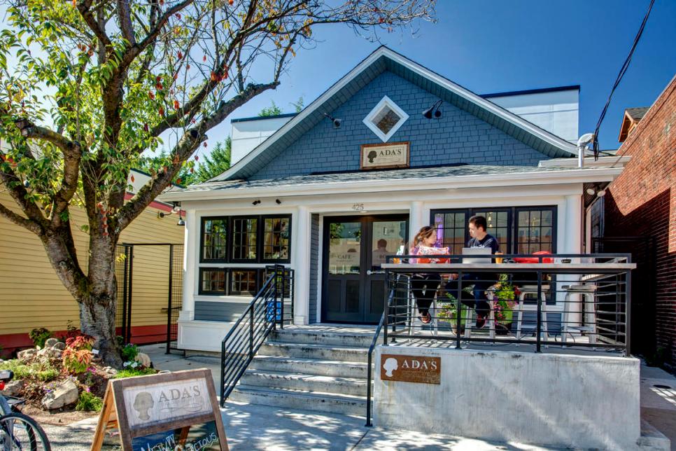 Exterior of Small Blue Cafe/Bookstore With Front Porch Seating
