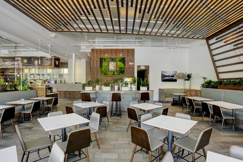 Contemporary White Restaurant Dining Space With Small Tables