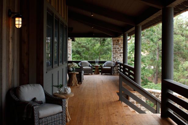 Covered Porch With Wicker Armchairs  & Wood Flooring