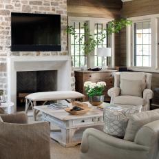Comfy, Transitional Living Room With Stone Fireplace Surround