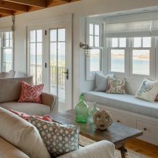 Waterfront Living Room Features Coastal Color Palette