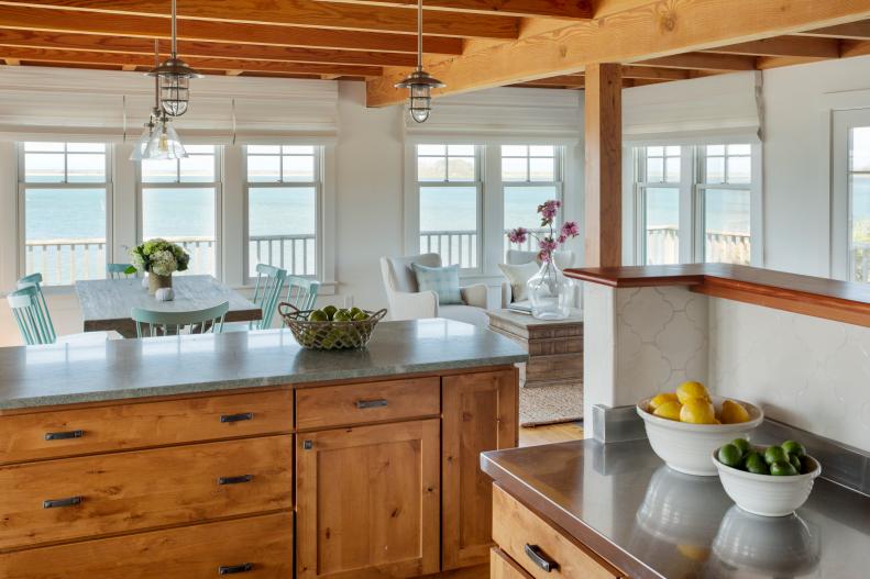 Coastal Kitchen With Natural Wood Cabinets and Wood Ceiling