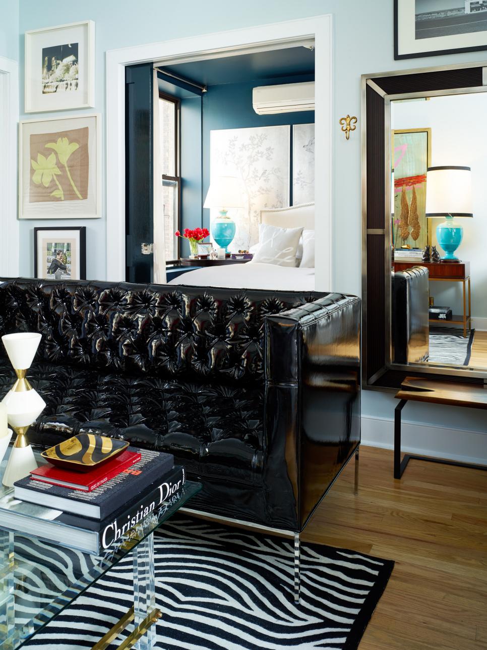  Small  Apartment  Living Room  With Black Tufted Leather Sofa 