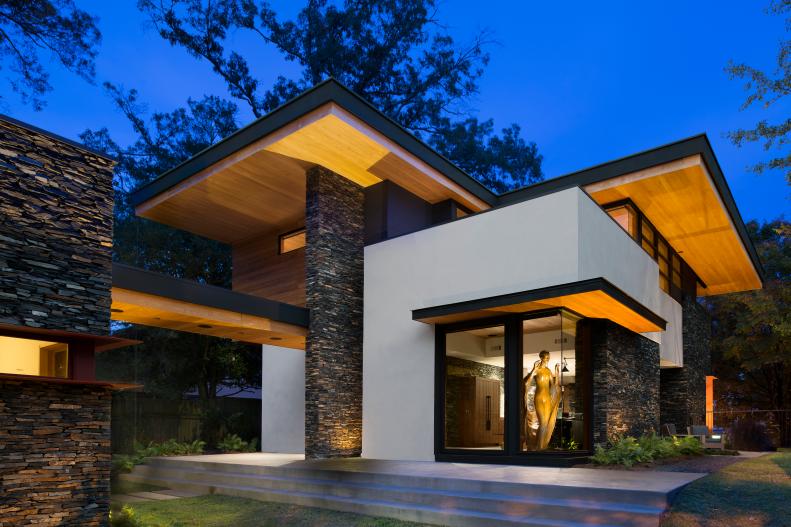 Back Exterior of Modern Home With Stacked Stone, Wood and Stucco