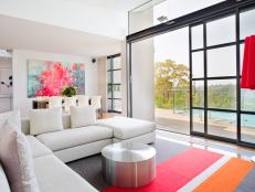 Modern Open Plan Living Room With White Sofa & Stainless Coffee Table