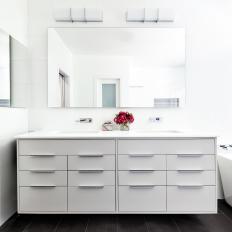 Crisp White Bathroom With Modern Floating Vanity