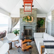 Cape Cod-Style Porch Features Midcentury Furniture