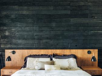 Black Wood Wall Behind Midcentury Modern Wood Bed