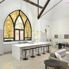 White Modern Great Room With Stained Glass Window