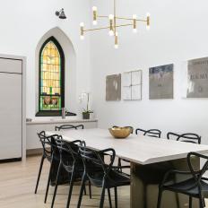 White Modern Dining Room With Stained Glass Window