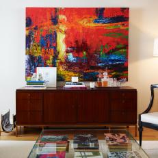 Abstract Art Bursts With Color in Hip Living Room