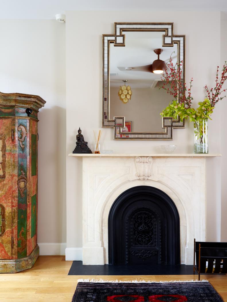 Traditional Black Fireplace With Light Marble Mantel