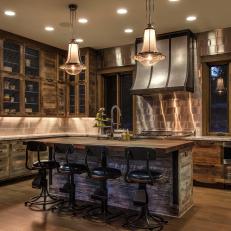 Brown Rustic Kitchen With Antique Barstools