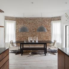 Neutral Contemporary Dining Room With Brick Wall