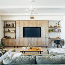 Living Room With Industrial Reclaimed Wood Cabinets 