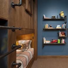 Pipe Bookshelves in Kid's Rustic Blue Room