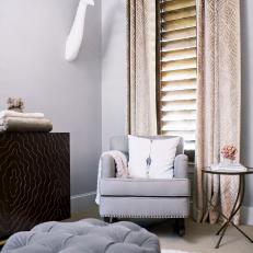 Gray Rocking Chair and Tufted Ottoman