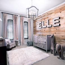 Neutral Rustic Nursery With White Rug