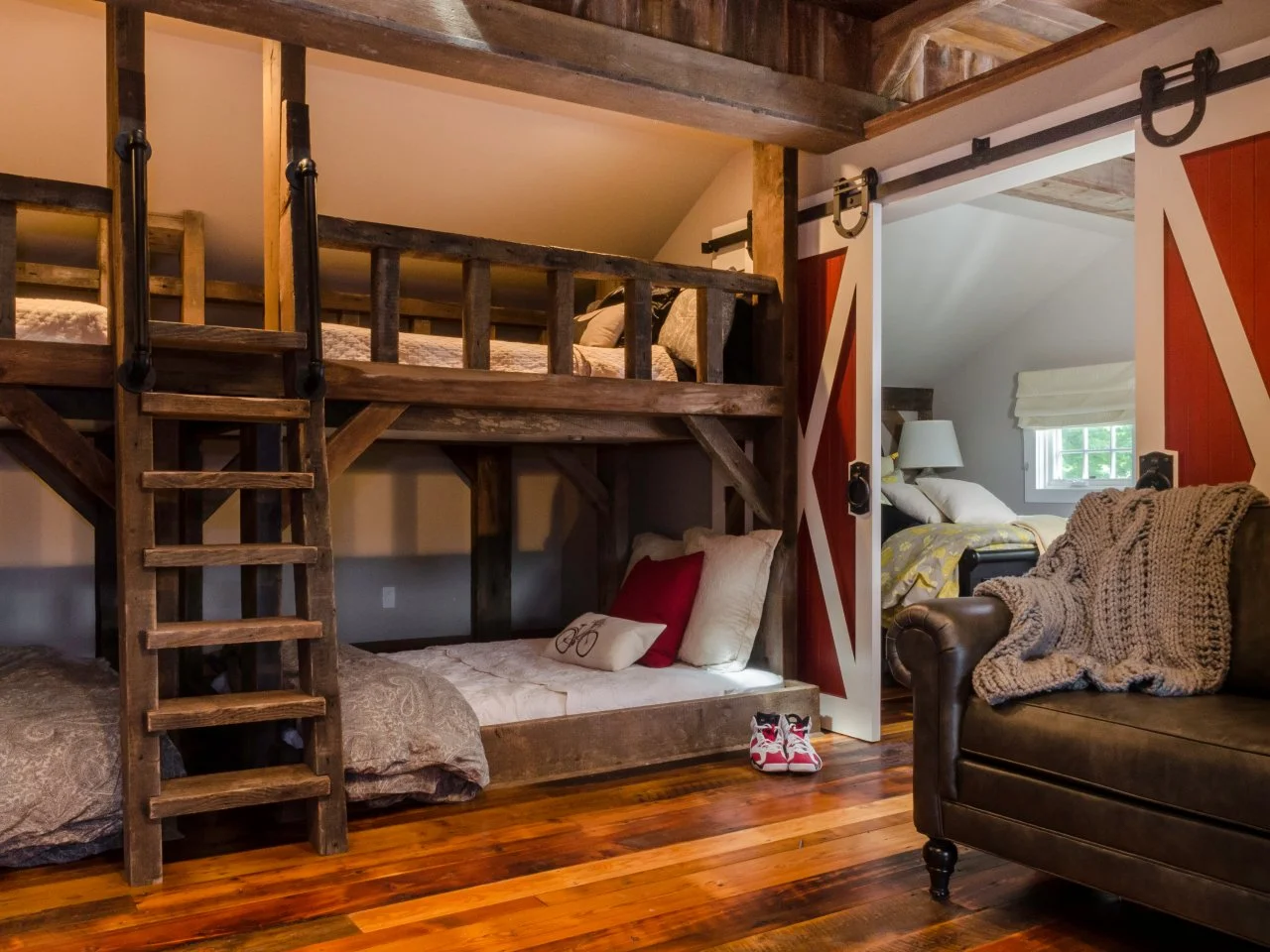 Kids Rustic Room With Bunk Beds and Barn Door Daniel Contelmo HGTV