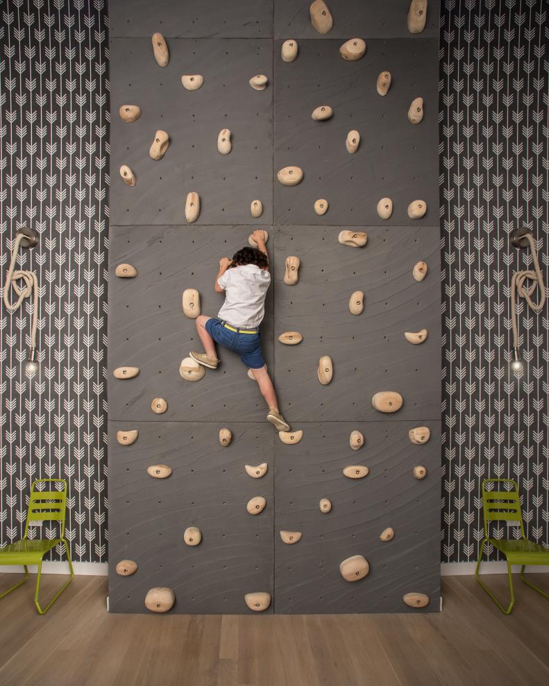 Gray Climbing Wall With Arrow Wallpaper