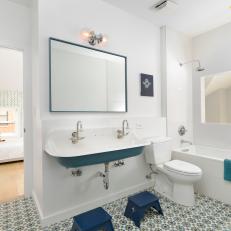 Blue and White Bathroom With Blue Double Sink