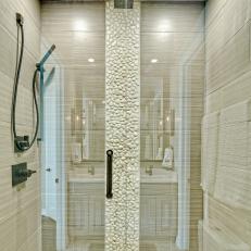 Neutral Walk-In Shower With White Stones