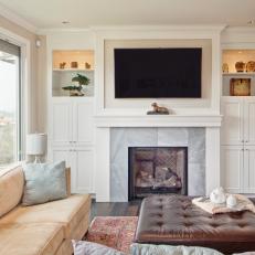 White Living Room With Marble Fireplace