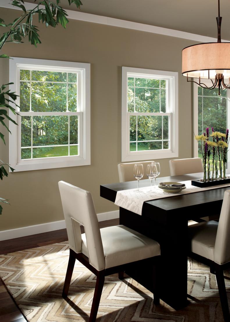Neutral Dining Room With Vinyl Windows