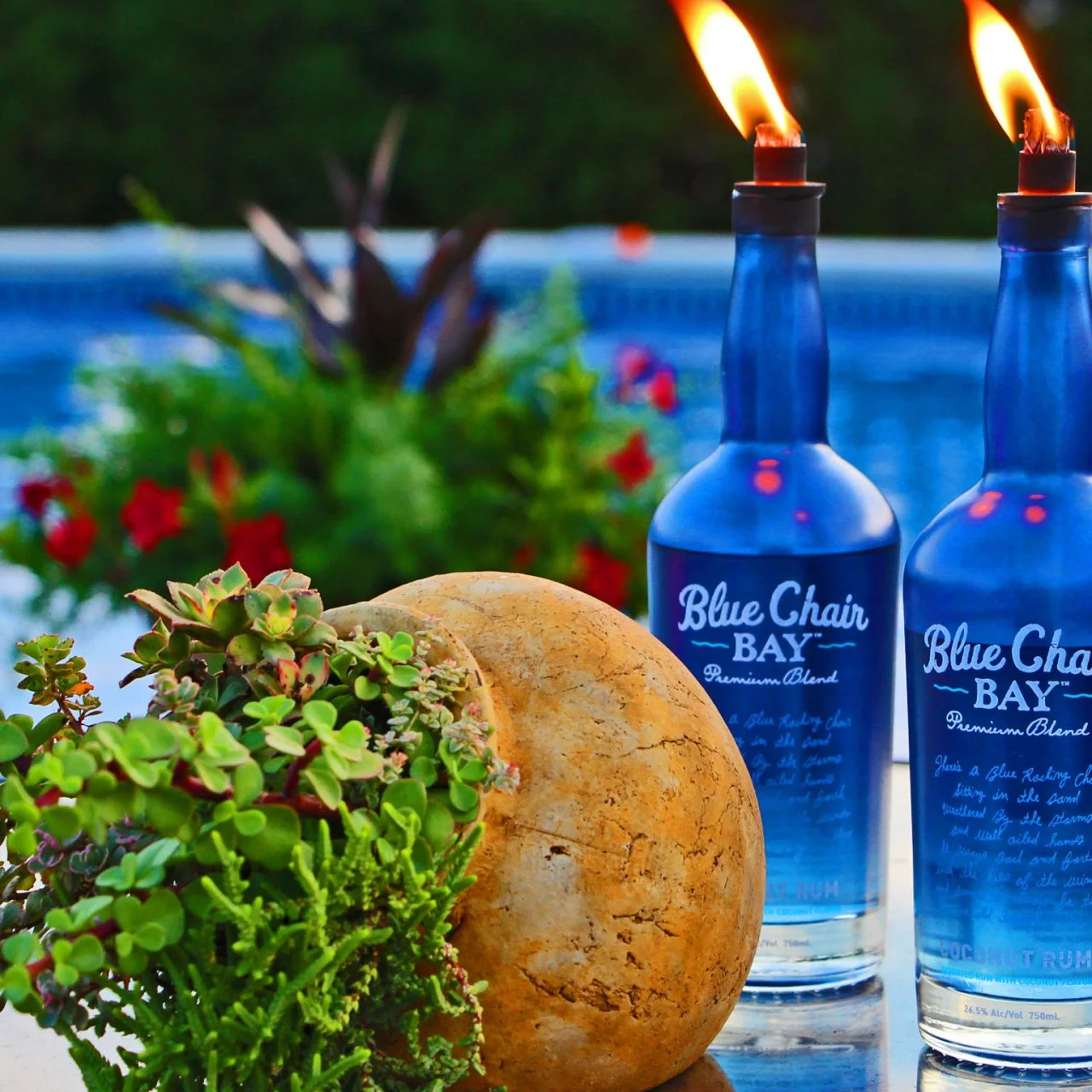 How to Upcycle Glass Bottles Into Citronella Torches HGTV