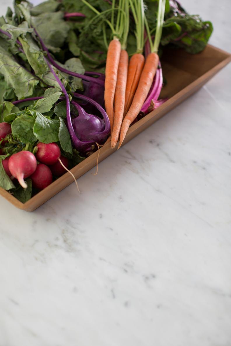 Produce in Tray on Top of Marble-Topped Kitchen Island