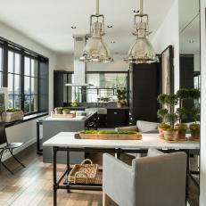 Black and White Transitional Kitchen With Metal Pendants