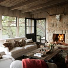 Neutral Transitional Living Room With Stone Fireplace