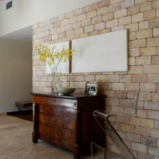 Neutral Transitional Foyer With Brick Wall