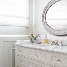 Gray and White Bathroom With Wallpaper